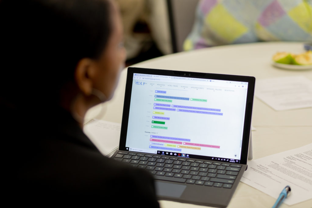 View over shoulder of Learn@DLF attendee's laptop